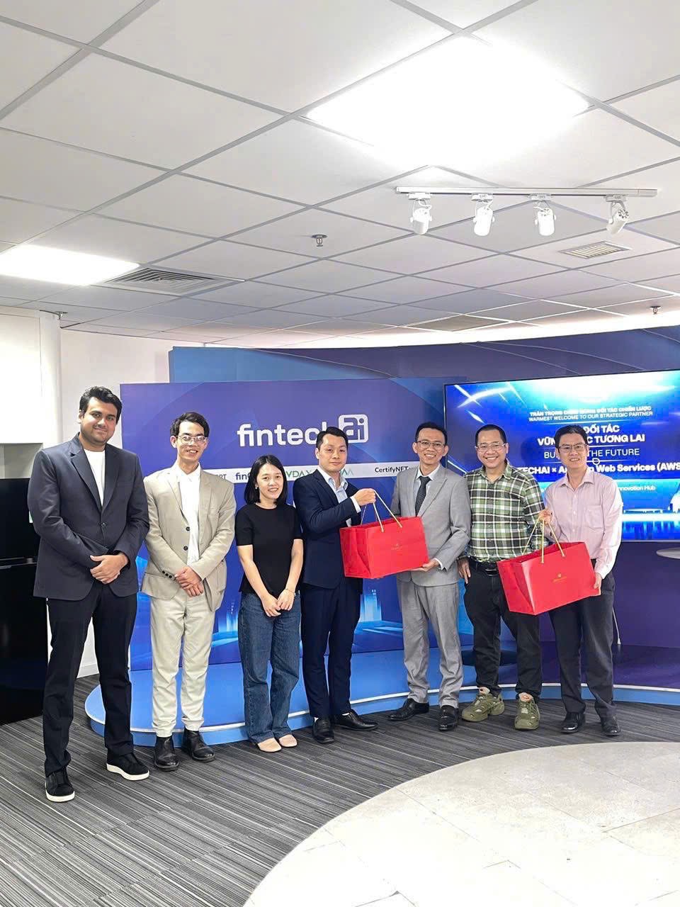 TitanBases, FintechAI and AWS representatives during a financial-services AI working session in Ho Chi Minh City